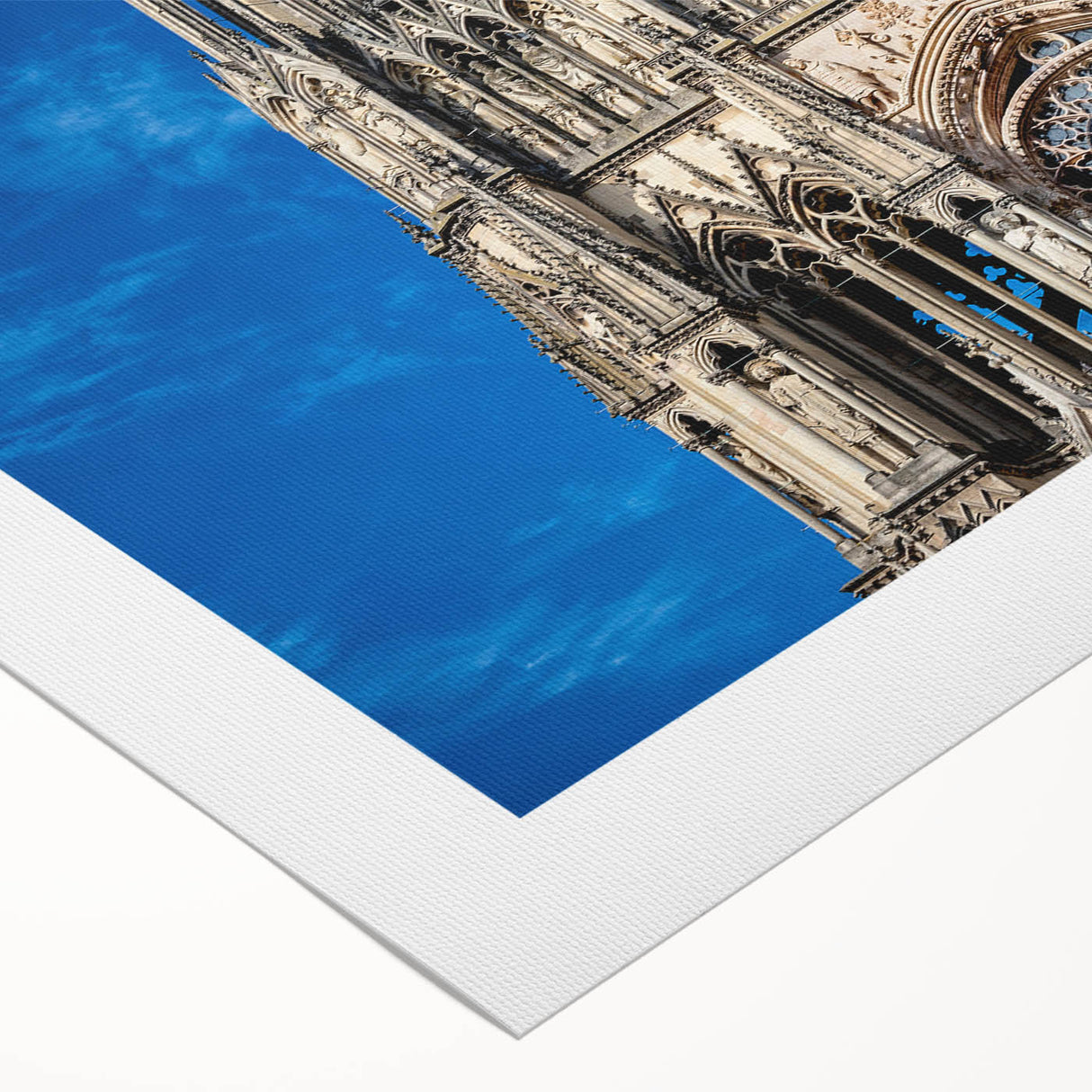 Art deco poster featuring a cathedral design in muted gold and blue tones on rolled canvas.