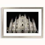 Abstract art print of a cathedral in muted silver and gray tones on a framed poster.