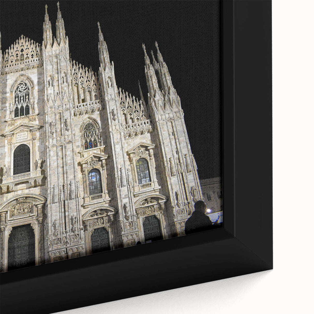 Close-up of a black wall art featuring a textured cathedral design in vibrant colors on a framed canvas.