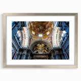 Abstract art print of a geometric church design in silver frame, featuring cool blue and gray tones.
