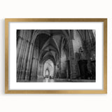 Textured abstract art print of a church design in muted gold and white tones on a framed canvas, suitable for bedroom decor.