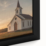 Extra large black wall art featuring a textured depiction of a colorful church design on a framed canvas.