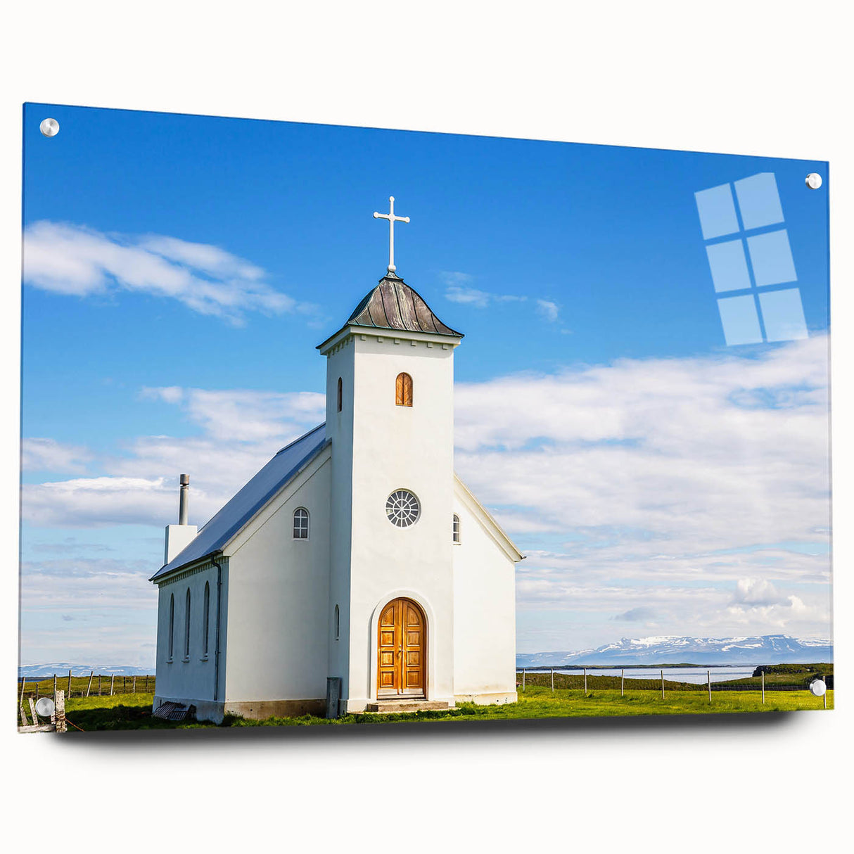 Large abstract wall art on acrylic glass depicting a serene church scene in soft blue and gray tones.