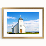 Textured abstract art print of a church in muted gold and white tones on a framed canvas, suitable for bedroom decor.