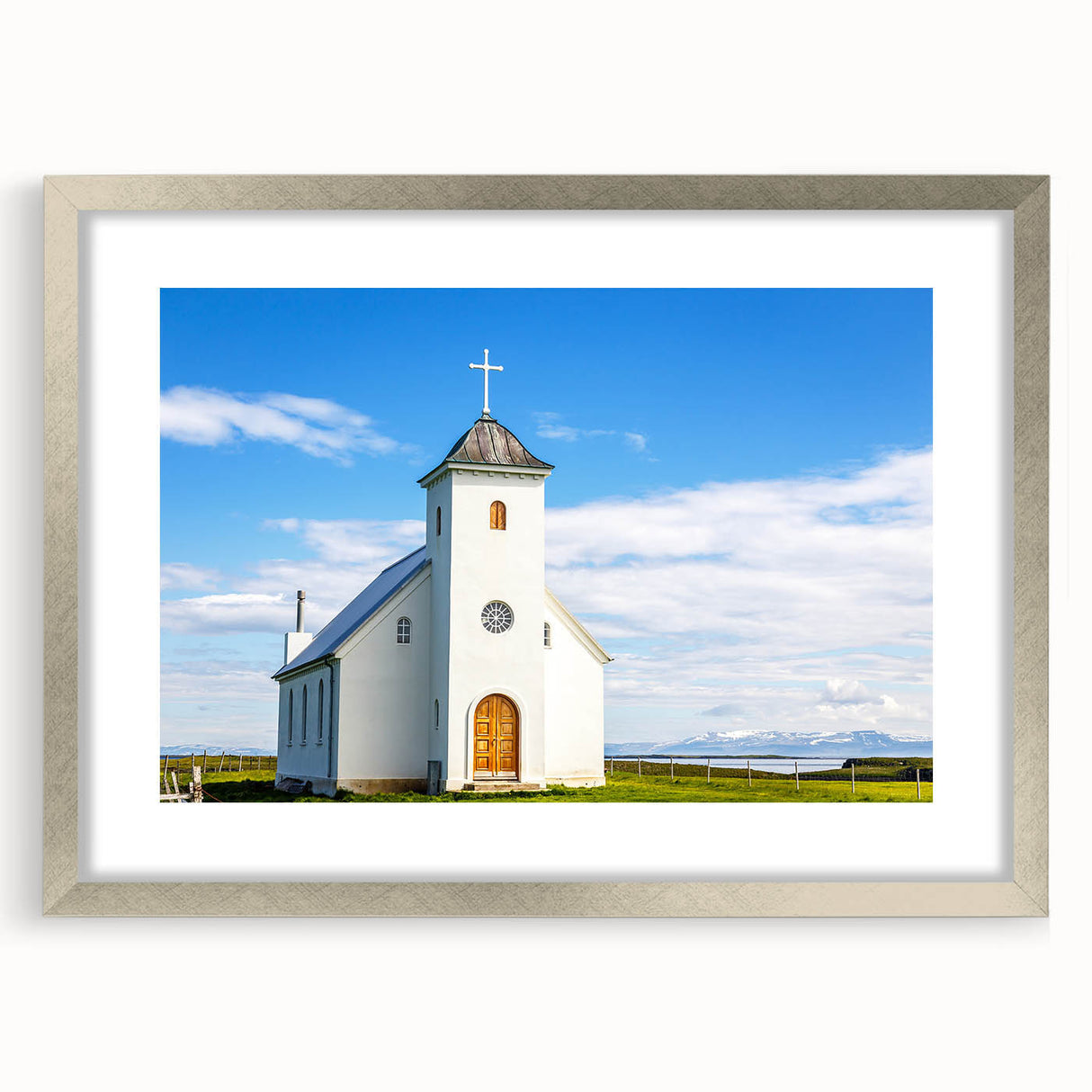 Abstract art print of a church design in silver frame with mat, featuring muted gray tones, ideal for dining room decor.
