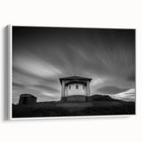 Framed canvas of a vintage poster featuring a black and white church landscape, ideal for bedroom wall art.