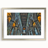 Abstract art print of a church, depicted in muted gray and silver tones on a framed canvas, suitable for dining room decor.
