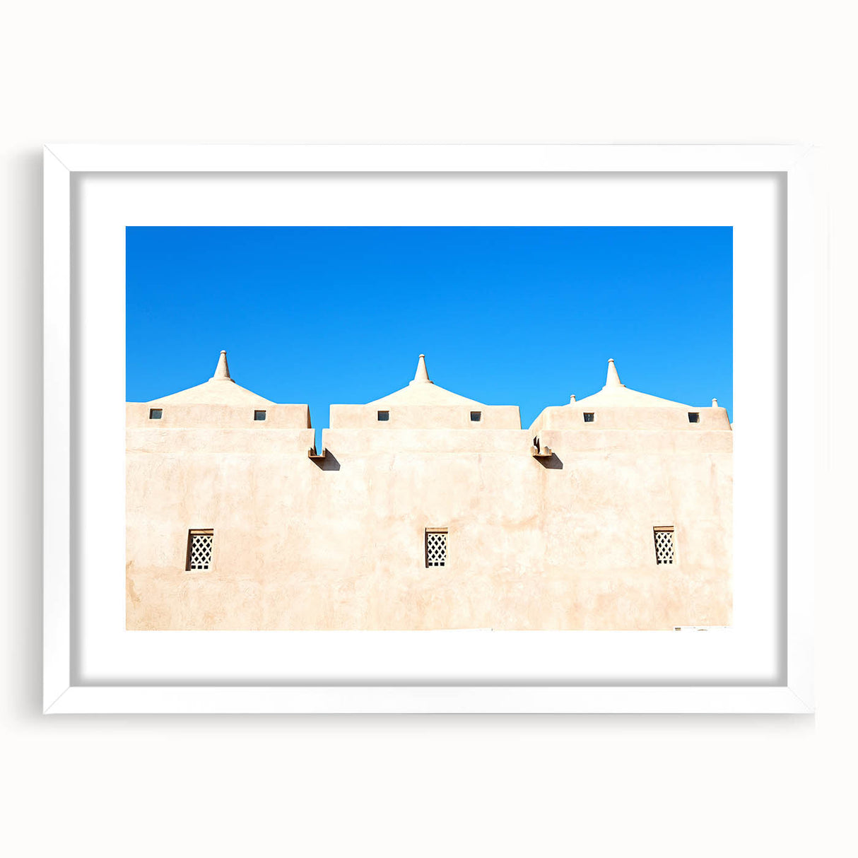 Extra large abstract art print of a mosque, featuring textured brush strokes in muted earth tones, framed with a white mat.
