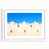 Extra large abstract art print of a mosque, featuring textured brush strokes in muted earth tones, framed with a white mat.