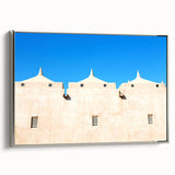 Vintage poster art of a mosque in vibrant colors on a large framed canvas, suitable for living room decor.