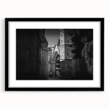 Extra large abstract art print of a mosque design in textured style, with muted earth tones on a black framed canvas.