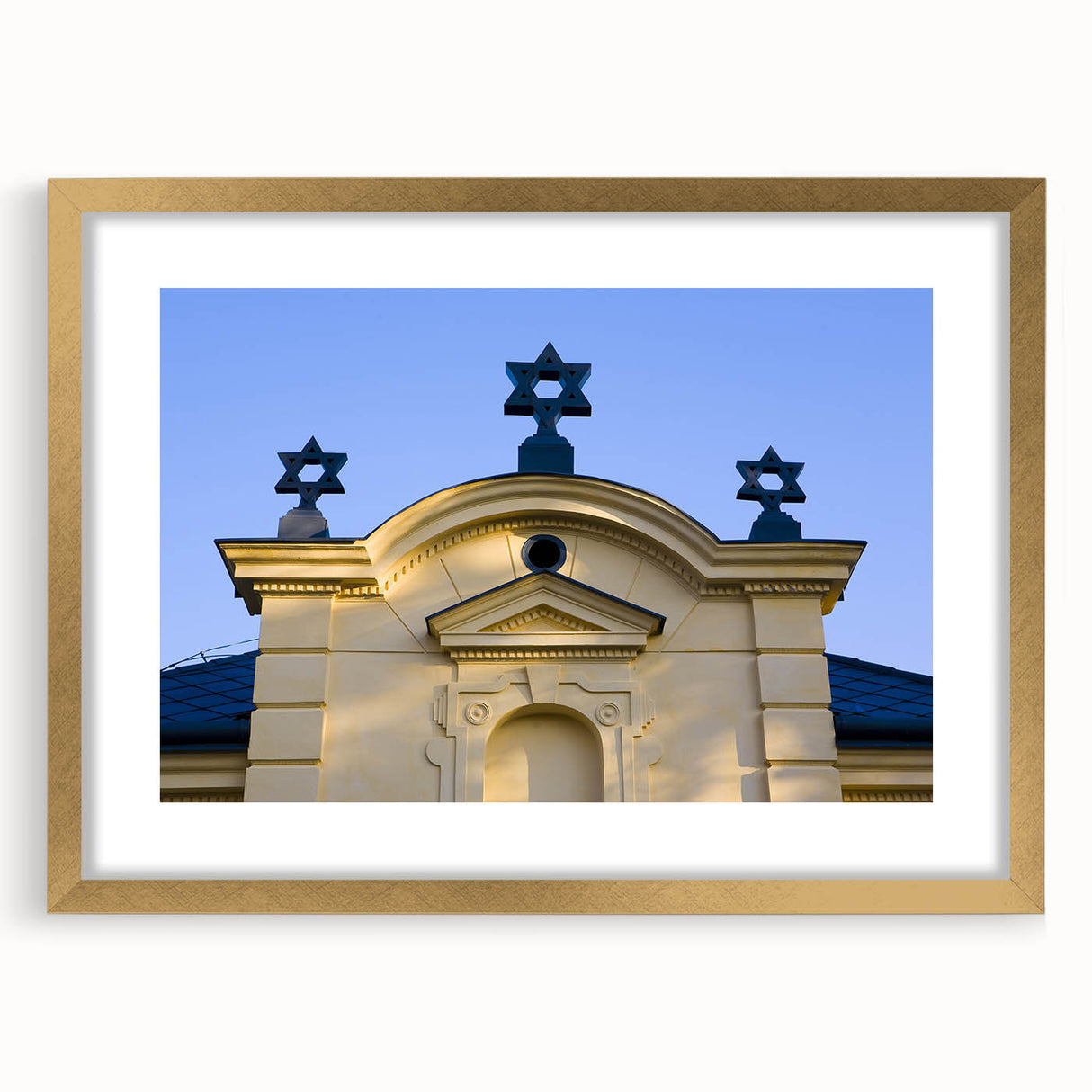 Textured abstract art print of a synagogue in muted gold and white tones on a framed canvas, suitable for bedroom art.