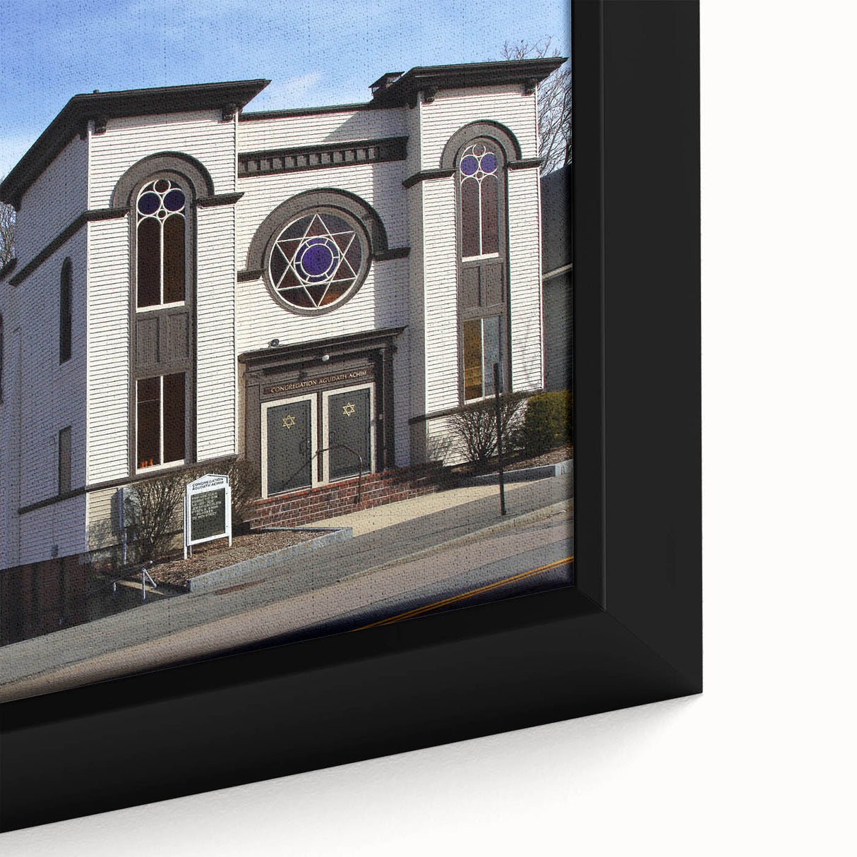 Extra large black wall art featuring a textured, colorful synagogue design on framed canvas, ideal for living room decor.