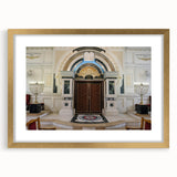 Abstract textured art print of a synagogue in muted gold and brown tones on a framed canvas, suitable for bedroom decor.