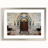 Abstract art print of a synagogue in muted silver and gray tones on a framed poster, ideal for dining room decor.
