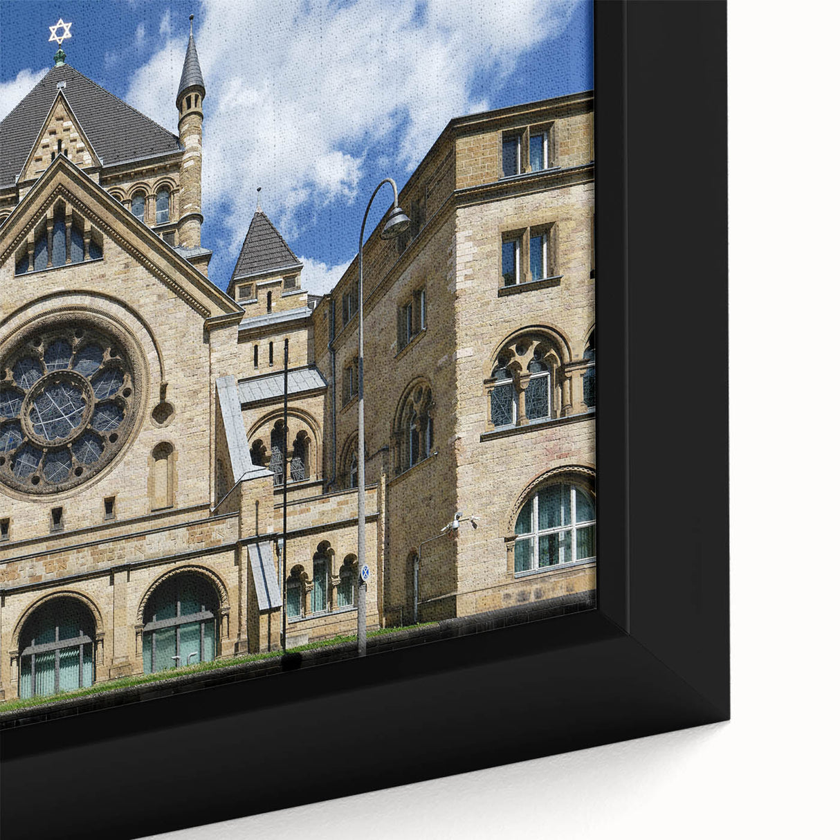 Extra large black wall art featuring a textured synagogue design in colorful hues on a framed canvas.