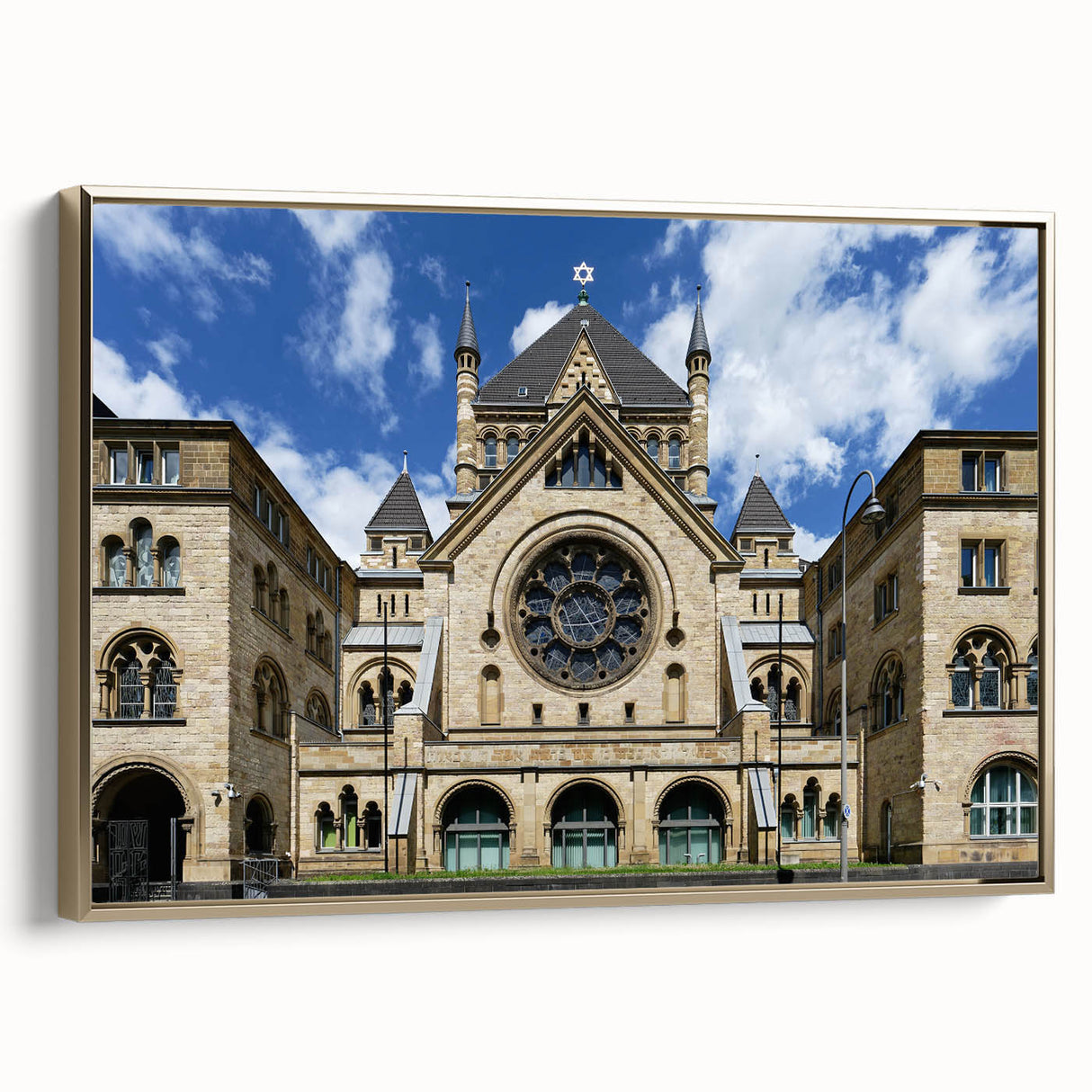 Framed canvas featuring a vintage poster of a colorful synagogue landscape, ideal for adding a cultural touch to any room.