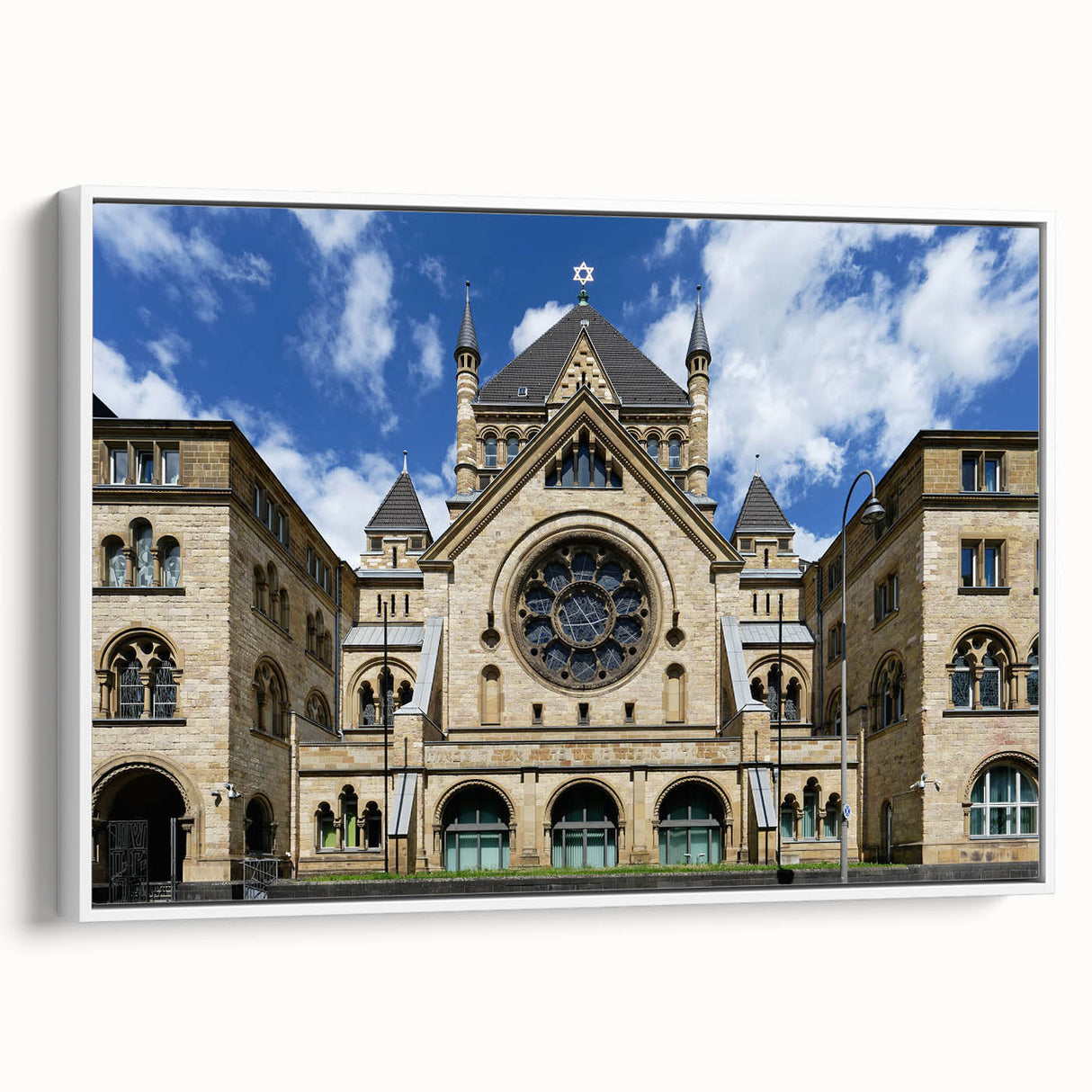 Framed canvas depicting a vintage-style synagogue in a black and white landscape, ideal for bedroom wall art.