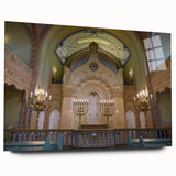 Large abstract wall art of a synagogue in muted gold and blue tones on acrylic glass, ideal for bedroom or dining room decor.