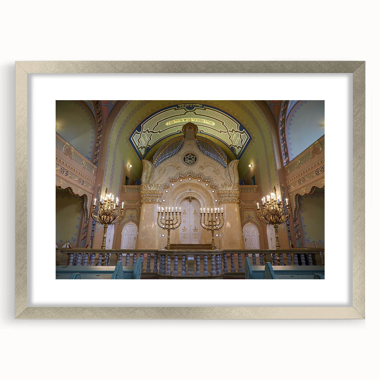 Abstract art print of a stylized synagogue in muted silver and gray tones on a framed poster.