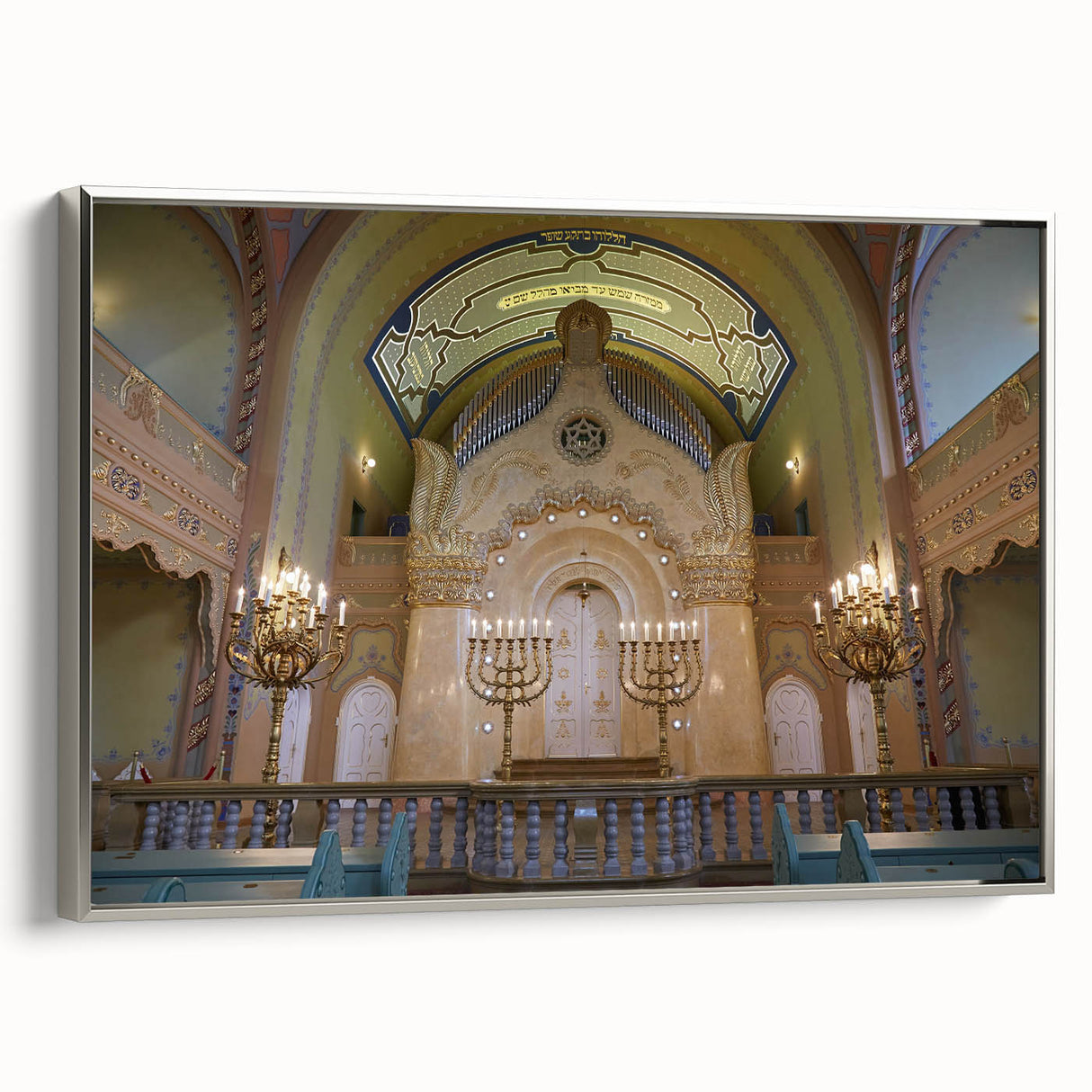 Vintage poster art of a synagogue in muted black with colorful accents on a large framed canvas.