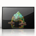 Framed wall art showcasing a vibrant chameleon design in various shades of green and blue, set against a sleek black frame, perfect for reptile enthusiasts.