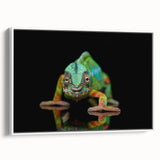 Framed canvas wall art showcasing a vibrant chameleon design in shades of green and orange, set against a white background, perfect for reptile enthusiasts and modern decor.