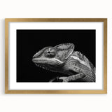 Framed wall art featuring a vibrant chameleon design with gold accents and a mat, showcasing a modern aesthetic perfect for reptile enthusiasts or home decor.