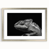 Framed wall art showcasing a vibrant chameleon design, featuring a silver frame and mat, ideal for reptile enthusiasts and modern decor.