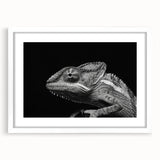 Charming wall art featuring a colorful chameleon design, framed with a white mat. This vibrant reptile artwork adds a playful touch to any modern decor.