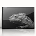 Framed wall art featuring a vibrant chameleon design in a modern black frame, perfect for adding a pop of color to any room decor. Ideal for reptile enthusiasts.