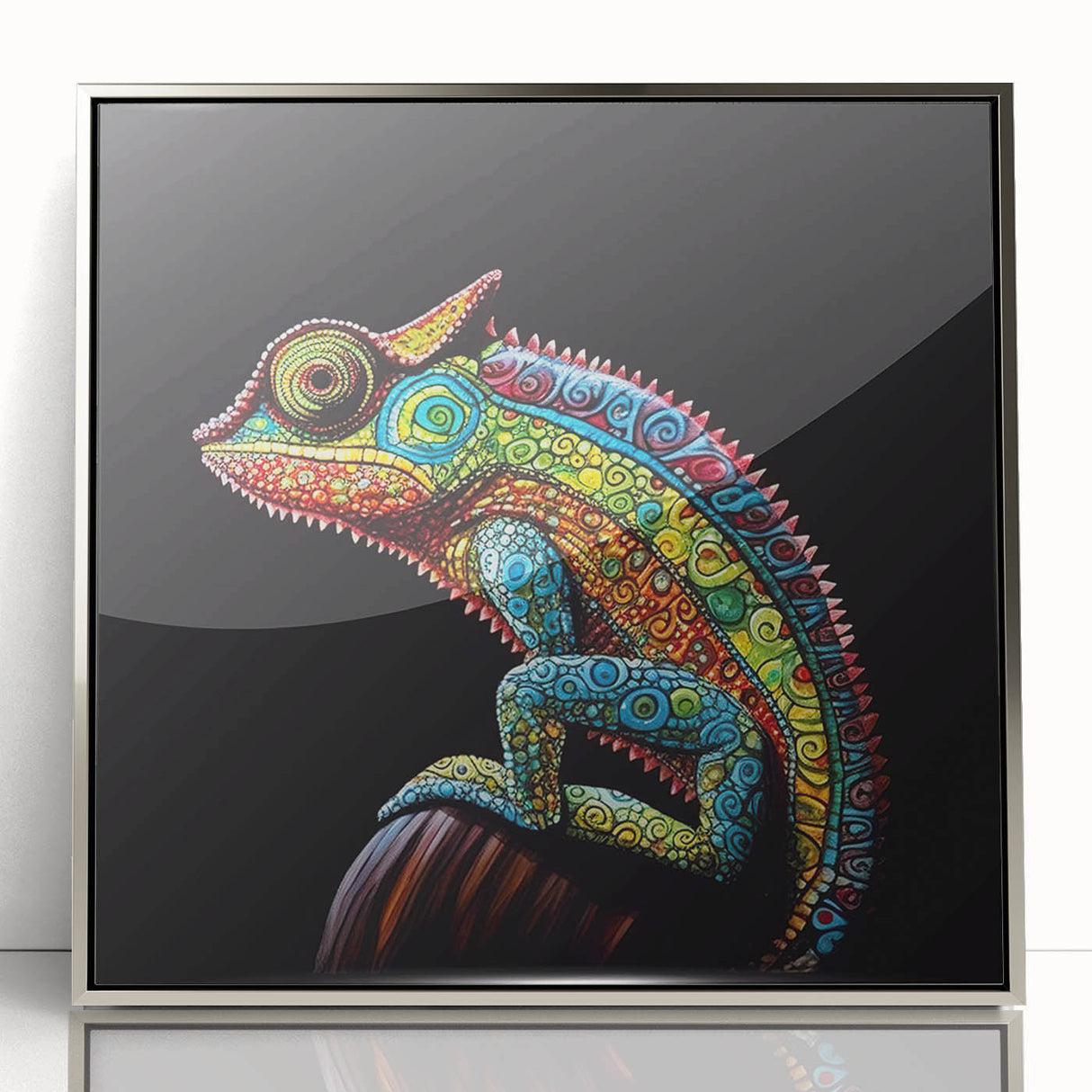 Framed wall art featuring a vibrant chameleon design with intricate details, set in a sleek silver frame, perfect for enhancing modern home decor.