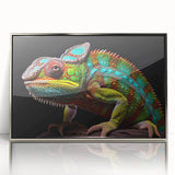 Framed wall art featuring a vibrant chameleon design in acrylic with a sleek silver frame, perfect for adding color to any modern decor.