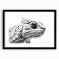 Chameleon-themed wall art featuring a vibrant design with intricate details, framed in black with a mat for a modern aesthetic, perfect for reptile lovers.