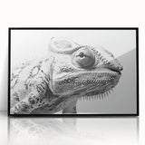 Framed wall art showcasing a vibrant chameleon design in striking colors, set against a black background, perfect for reptile enthusiasts and home decor.