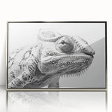 Framed wall art featuring a vibrant chameleon design with intricate details, set against a silver background, perfect for adding a touch of nature to home decor.