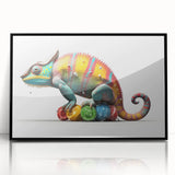Framed wall art featuring a vibrant chameleon design with intricate details and a black frame, ideal for adding a colorful touch to modern home decor.