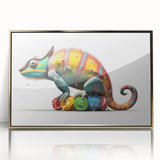 Framed wall art featuring a vibrant chameleon design with a gold-accented frame, showcasing intricate details and vivid colors, ideal for reptile enthusiasts and modern decor.