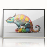 Framed wall art featuring a vibrant chameleon design, set against a sleek silver acrylic background, perfect for adding a colorful touch to modern decor.