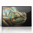Framed wall art featuring a vibrant chameleon design on a black background, showcasing intricate details and colors, perfect for reptile enthusiasts and modern decor.