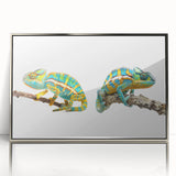 Framed wall art featuring a vibrant chameleon design, showcasing intricate details and vivid colors, set in a sleek silver frame for modern decor.