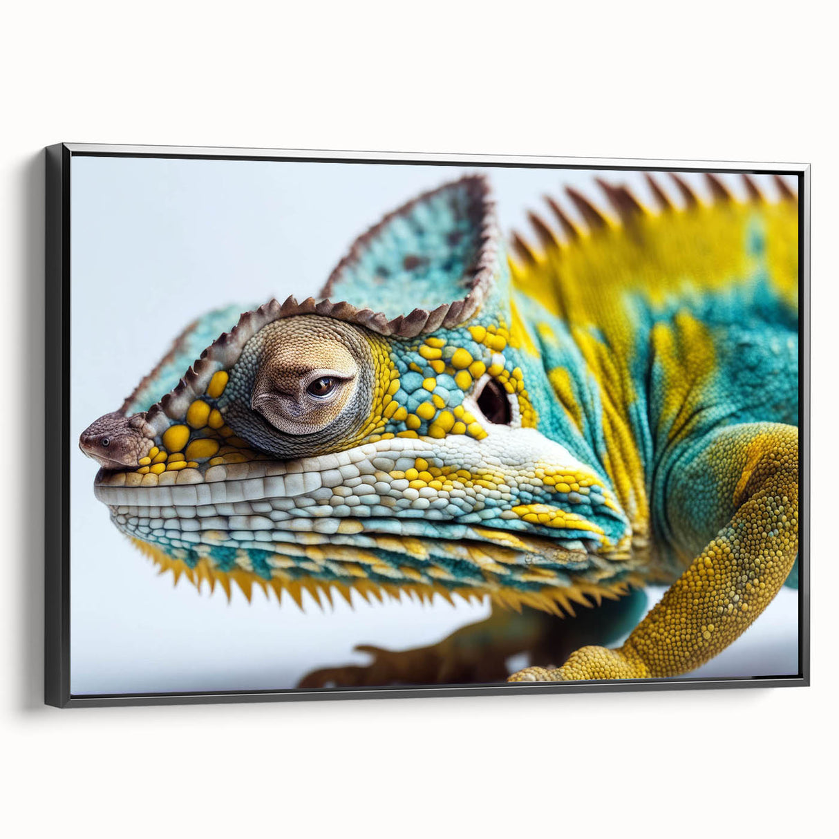 Framed canvas wall art showcasing a vibrant chameleon design in striking colors, displayed from a side view against a sleek black frame, perfect for reptile enthusiasts.