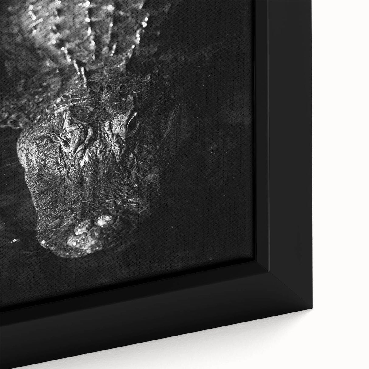 Close-up view of a framed canvas wall art featuring an intricate design of reptiles, gators, and crocodiles in vibrant colors, perfect for wildlife enthusiasts and home decor.