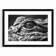 Framed wall art featuring a stunning reptile design showcasing alligators and crocodiles, presented in a sleek black frame with a white mat for a modern touch. Ideal for nature enthusiasts and wildlife decor.