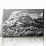 Framed wall art featuring an intricate design of reptiles, including alligators and crocodiles, showcased in a gold frame with an acrylic front, perfect for nature enthusiasts.