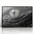 Framed wall art featuring a detailed reptile design showcasing alligators and crocodiles, set in a sleek black frame, perfect for nature enthusiasts and modern decor.