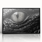 Framed wall art featuring a detailed reptile design showcasing alligators and crocodiles, set in a sleek black frame, perfect for nature enthusiasts and modern decor.