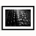 Black-framed wall art showcasing a vibrant collection of reptile-themed designs, including alligators and crocodiles, ideal for nature enthusiasts and modern decor.