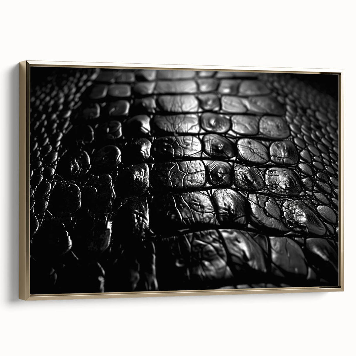 Framed wall art featuring a stylish design of reptiles, gators, and crocodiles, with a gold frame, perfect for adding a touch of nature-inspired elegance to any room.