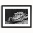 Framed wall art collection featuring a vibrant design of reptiles, gators, and crocodiles, set against a sleek black mat, perfect for nature enthusiasts.